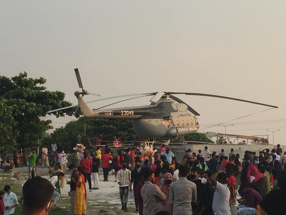 Decommisioned Helicopter in front of Sagara Kaniyaka sculpture at Shanghumugham Beach