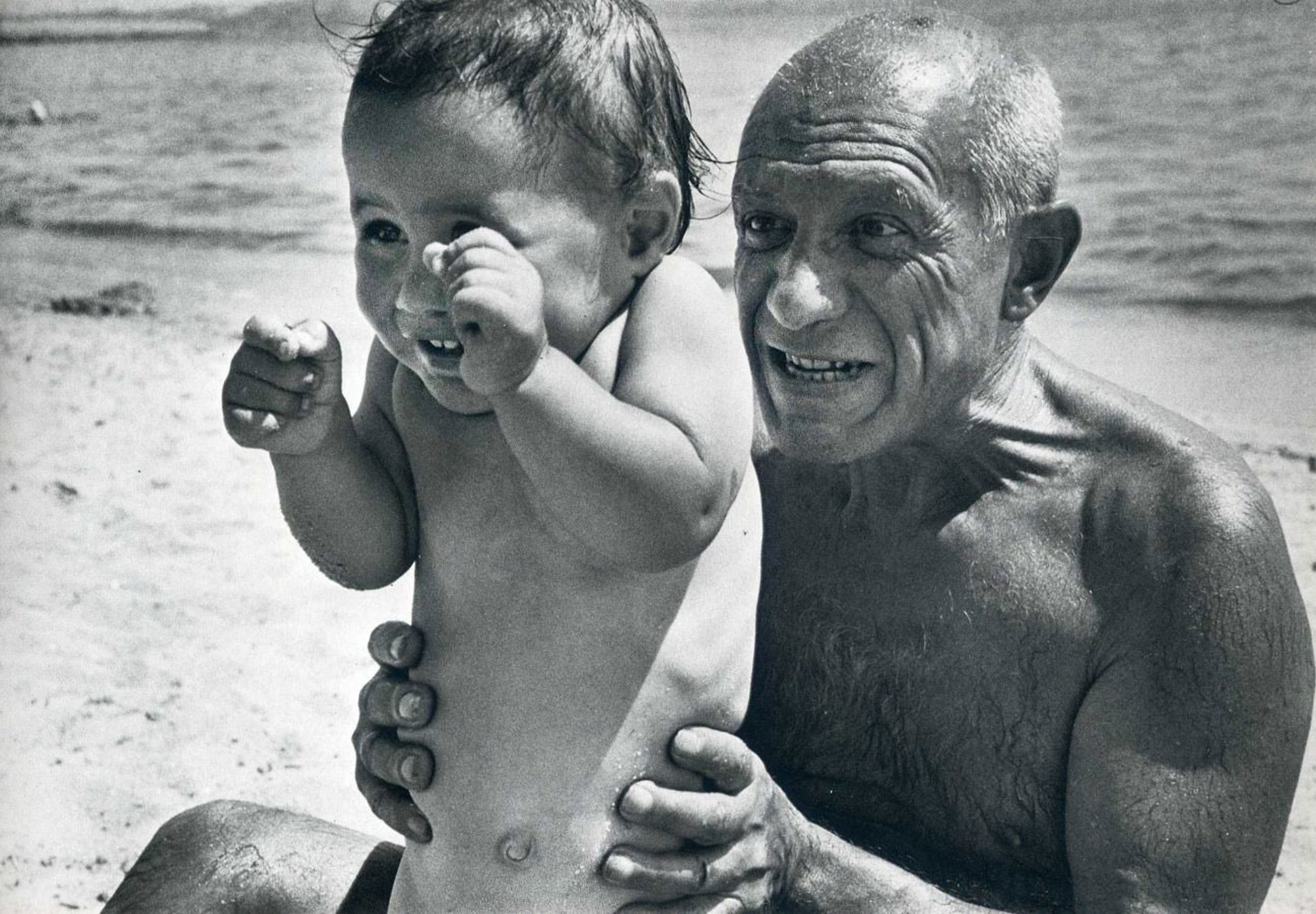 Pablo Picasso playing with his son Claude © Robert Capa 1948 / Magnum Photos | Image source internet
