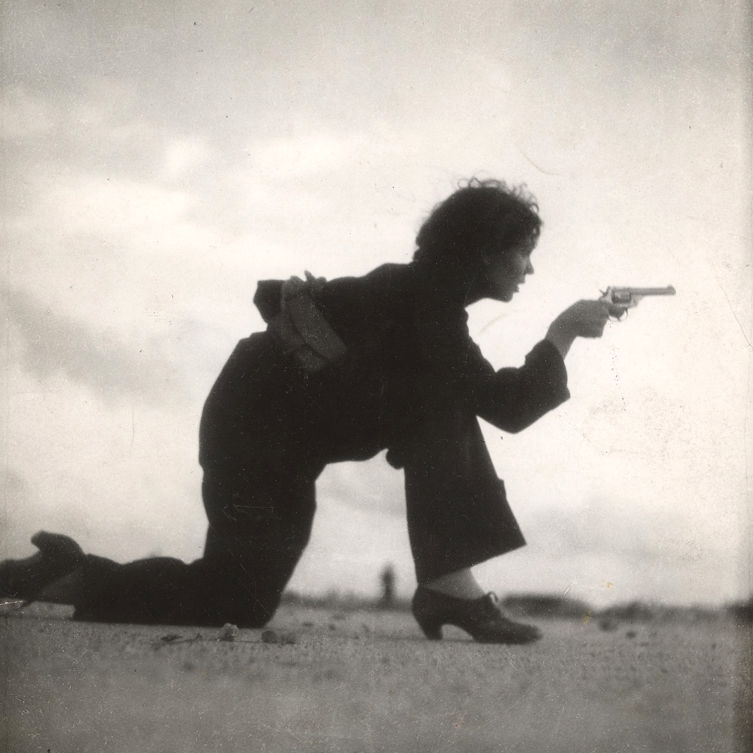 Gerda Taro’s photo of a militia member training on the beach outside Barcelona August 1936