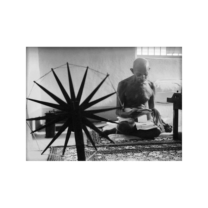 Gandhi at his spinning wheel by Margaret White Bourke